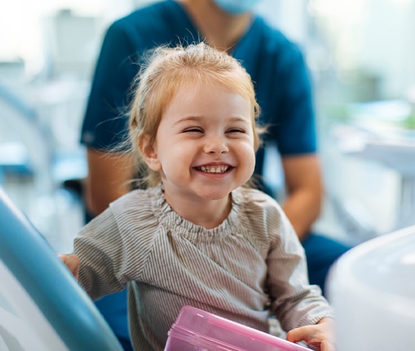 Kid-friendly dentist in Phoenix AZ examining a child during a comfortable dental visit at 7 North Dental