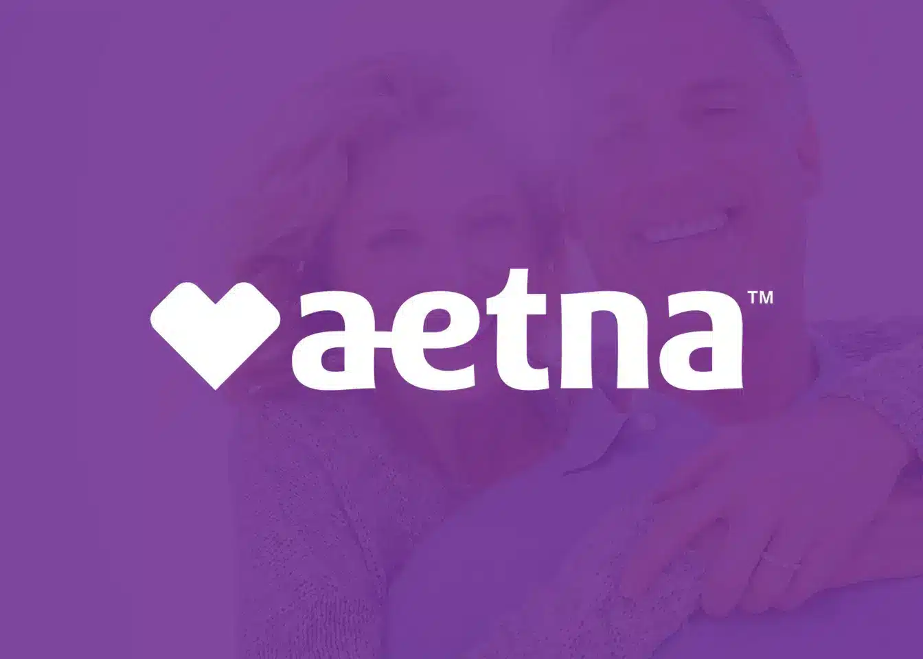 Aetna logo with white heart symbol on purple background gradient